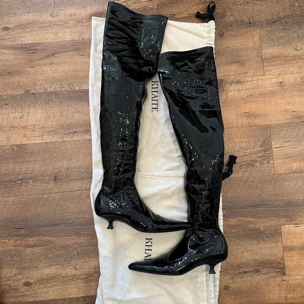 Khaite patent leather knee high boots